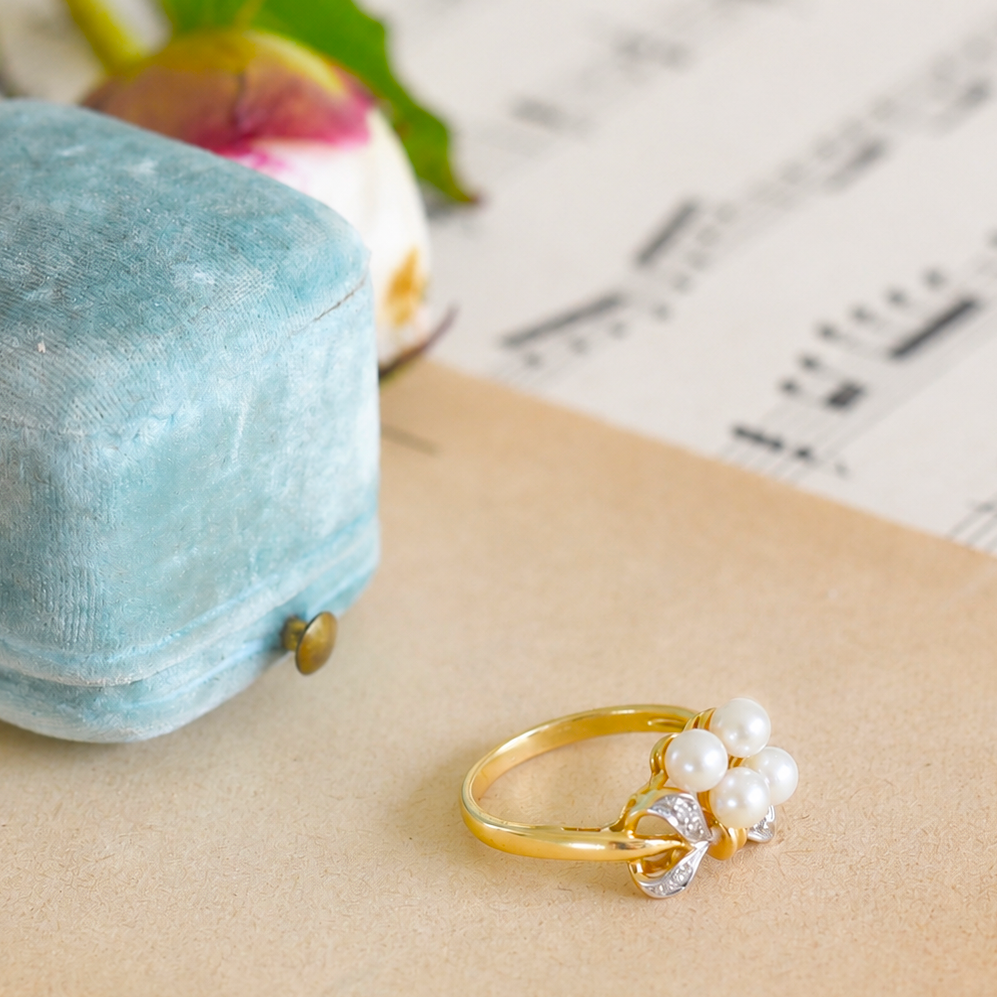 Eleganter Bicolor-Perlenring mit Brillanten aus 750 Gold